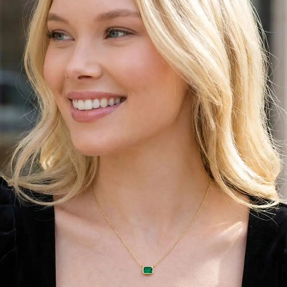 May birthstone necklace featuring and emerald shown on model variant--14K-yellow-gold variant--14K-white-gold variant--14K-rose-gold variant--Sterling-silver variant--Emerald