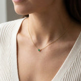 14K gold emerald necklace shown on model variant--14K-rose-gold,  variant--14K-yellow-gold,  variant--14K-white-gold, variant--Sterling-silver, variant--Emerald