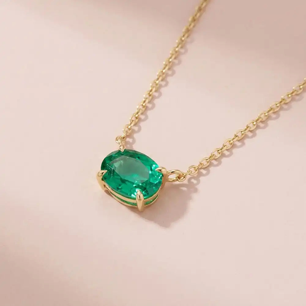 14K gold emerald necklace with horizontal oval setting variant--14K-rose-gold variant--14K-white-gold variant--14K-yellow-gold variant--Sterling-silver variant--Emerald