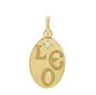 Hand-finished round zodiac charm in 14K yellow gold, engraved with the sign of Leo