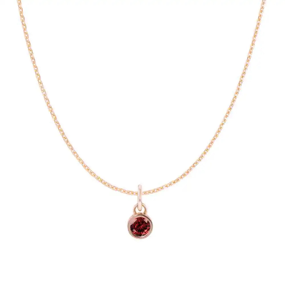 Garnet birthstone charm necklace in 14K rose gold, bezel-set pendant, product shot variant--14K-rose-gold variant--Garnet