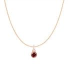 Garnet birthstone charm necklace in 14K rose gold, bezel-set pendant, product shot variant--14K-rose-gold