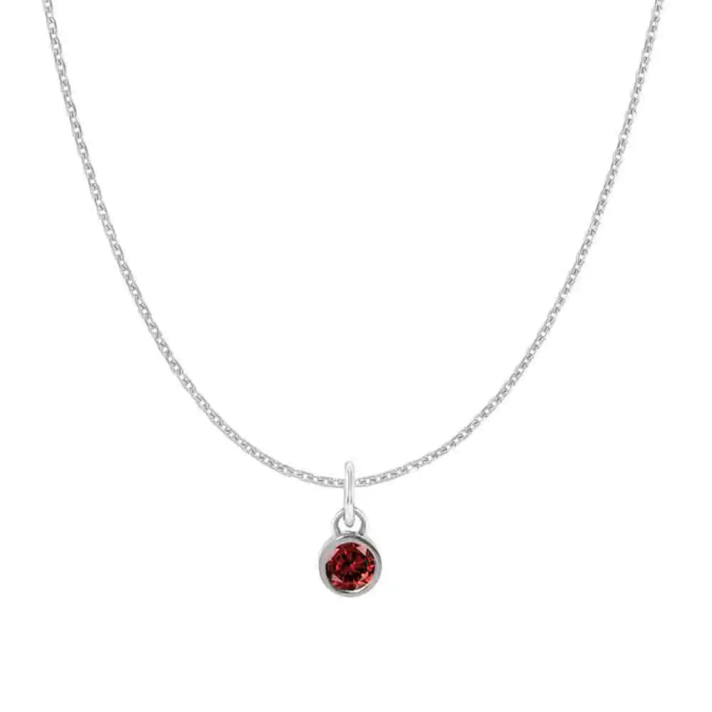 Natural garnet birthstone charm necklace in 14K white gold, bezel-set pendant on cable chain, product shot