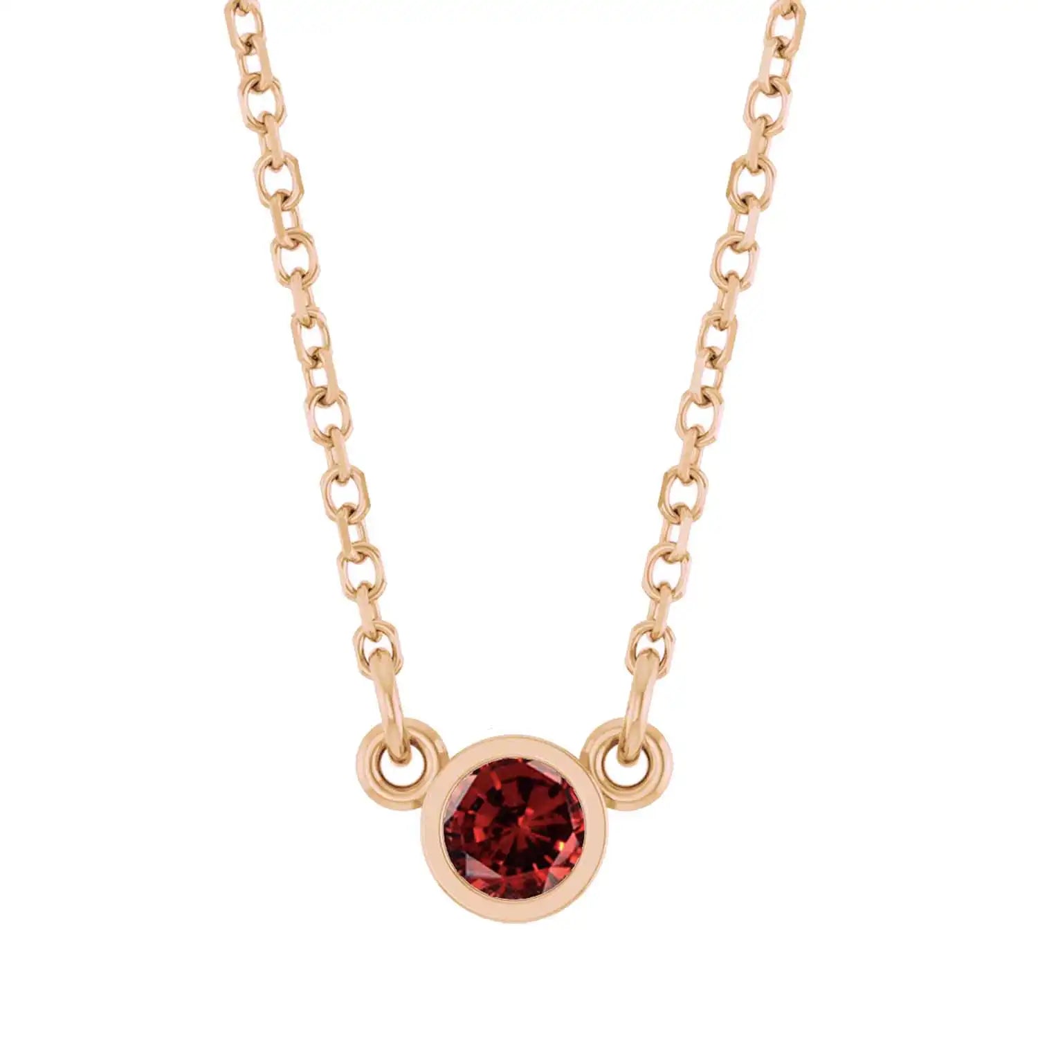Bezel-set garnet birthstone necklace in 14K rose gold, product view