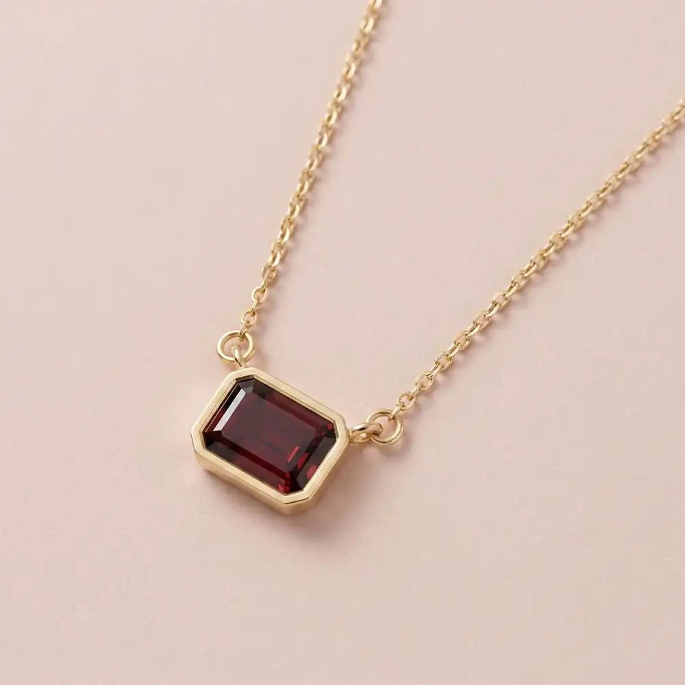 east west garnet necklace in bezel-set 14K yellow gold variant--14K-rose-gold variant--14K-white-gold variant--14K-yellow-gold variant--Sterling-silver variant--Garnet