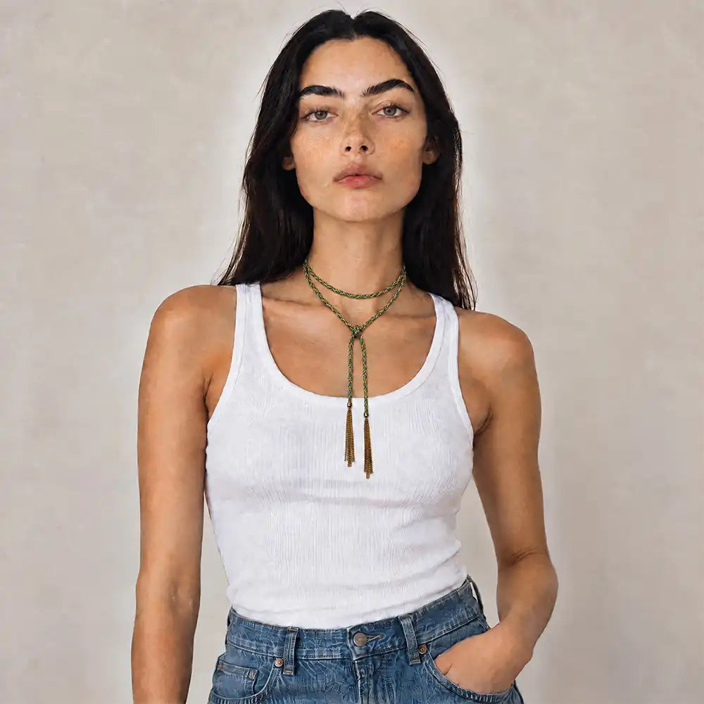 Green braided chain and silk lariat necklace in 14K gold-fill, wrapped on model