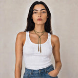 Green braided chain and silk lariat necklace in 14K gold-fill, wrapped on model
