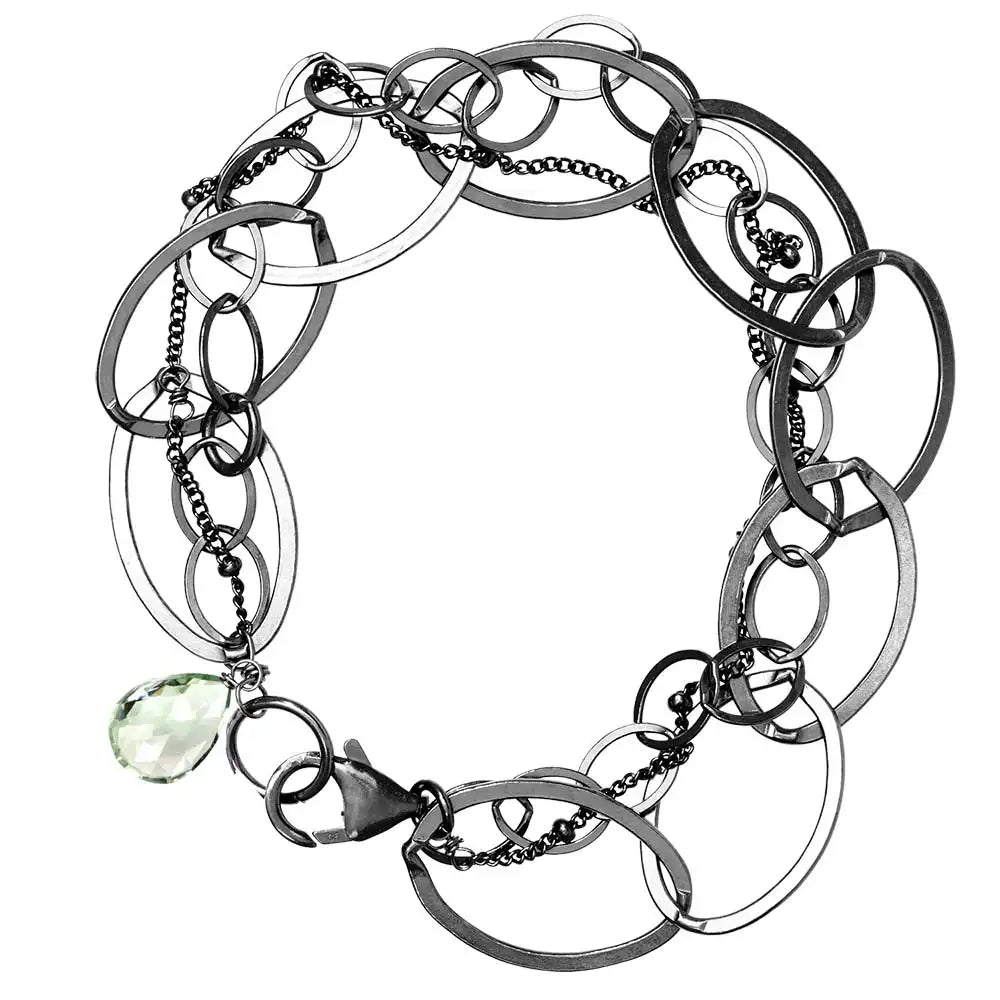 Natural green amethyst woven chain bracelet in sterling silver, flat lay on neutral background sterling silver variant--Oxidized-sterling-silver