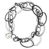 Natural green amethyst woven chain bracelet in sterling silver, flat lay on neutral background sterling silver variant--Oxidized-sterling-silver