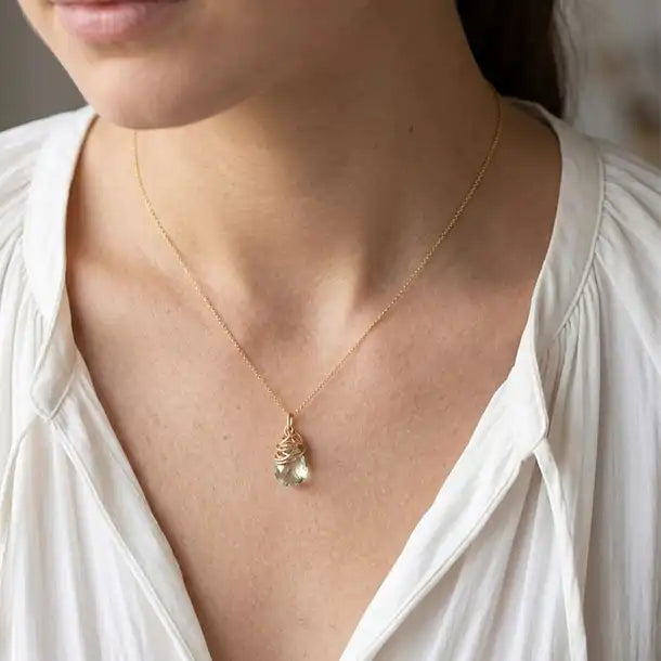 Natural green amethyst pendant necklace in sterling silver, close-up of setting in gold-fill