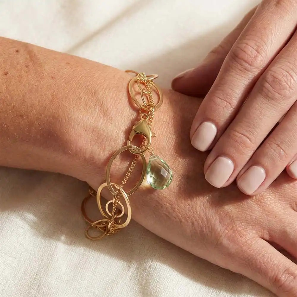 Natural green amethyst woven chain bracelet in gold-fill shown on model variant--Gold-fill variant--Sterling-silver variant--Oxidized-sterling-silver variant--Green-Amethyst