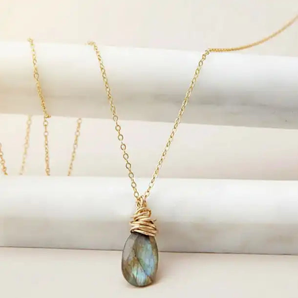 Natural labradorite pendant necklace in sterling silver, styled on chain necklace