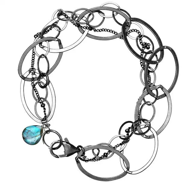 Natural labradorite woven chain bracelet in sterling silver, flat lay on neutral background sterling silver variant--Oxidized-sterling-silver variant--Labradorite