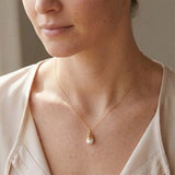 Pearl pendant Necklace shown on model  variant--Gold-fill, variant--Rose-gold-fill, variant--Sterling-silver, variant--Oxidized-sterling-silver variant--Pearl