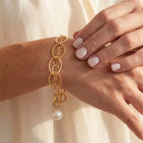 Natural pearl woven chain bracelet in gold-fill shown on model variant--Gold-fill variant--Sterling-silver variant--Oxidized-sterling-silver variant--Pearl