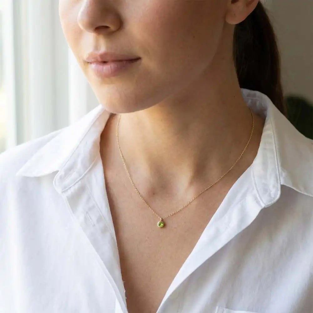 Peridot birthstone necklace, featuring a 3mm natural gemstone on a delicate chain