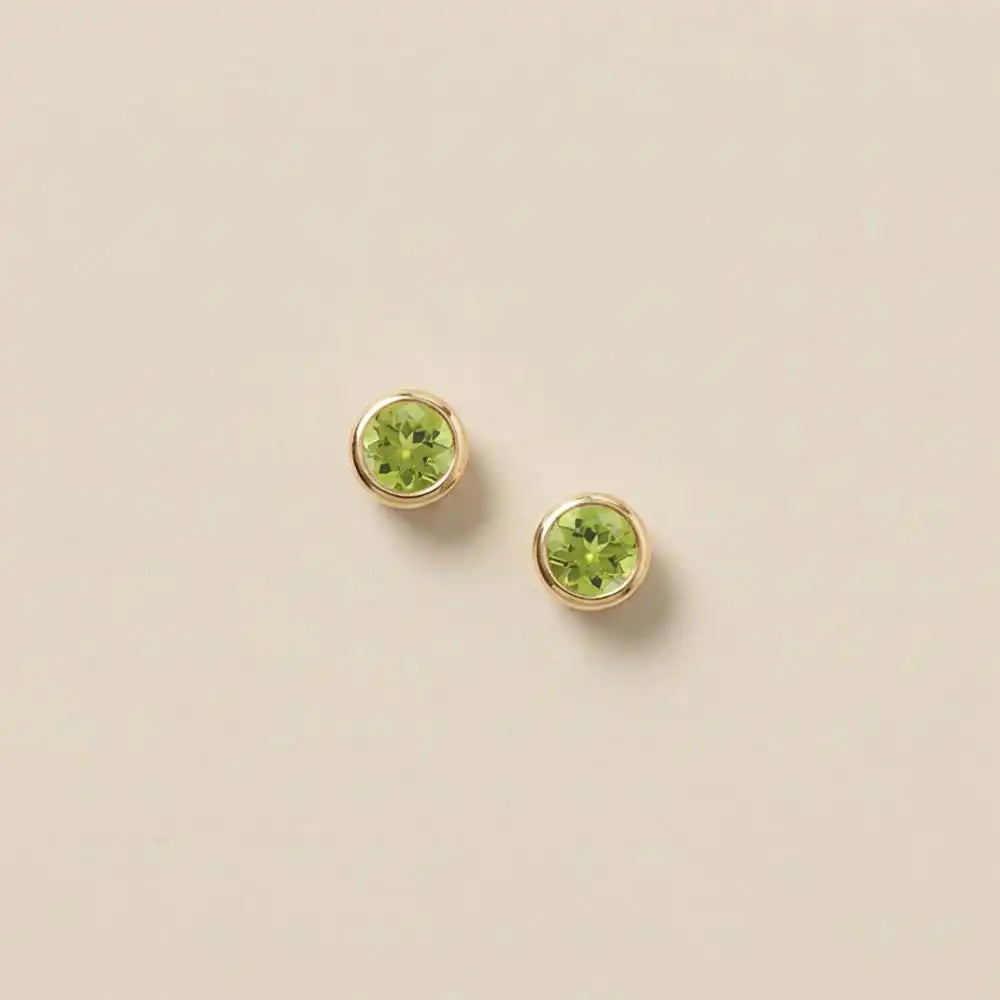 Peridot stud earrings in 14K gold, 4mm genuine peridot, product shot