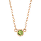 Bezel-set peridot birthstone necklace in 14K rose gold, product view