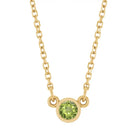 Bezel-set peridot birthstone necklace in 14K yellow gold, product view variant--14K rose gold