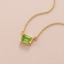 East West peridot necklace in 14K yellow gold variant--14K-yellow-gold variant--14K-white-gold variant--14K-rose-gold variant--Sterling-silver variant--Peridot