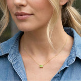 August birthstone necklace featuring vivid peridot shown on model variant--14K-yellow-gold variant--14K-white-gold variant--14K-rose-gold variant--Sterling-silver variant--Peridot