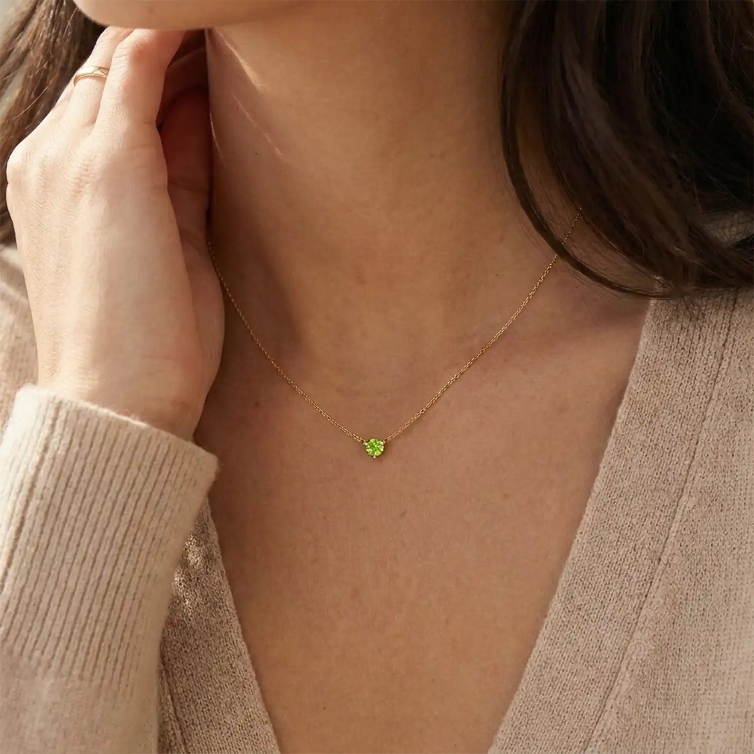 14K gold peridot necklace shown on model variant--14K-rose-gold, variant--14K-yellow-gold, variant--14K-white-gold, variant--Sterling-silver