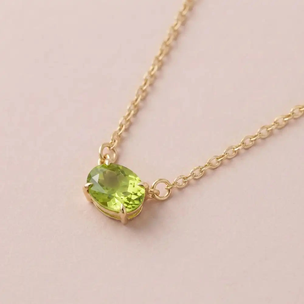 East-west peridot necklace in 14K yellow gold for August birthstone variant--14K-rose-gold variant--14K-white-gold variant--14K-yellow-gold variant--Sterling-silver variant--Peridot