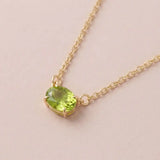 East-west peridot necklace in 14K yellow gold for August birthstone variant--14K-rose-gold variant--14K-white-gold variant--14K-yellow-gold variant--Sterling-silver variant--Peridot