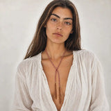 Pink braided chain and silk lariat necklace in 14K gold-fill, worn long on model