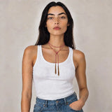 Pink braided chain and silk lariat necklace in 14K gold-fill, wrapped on model