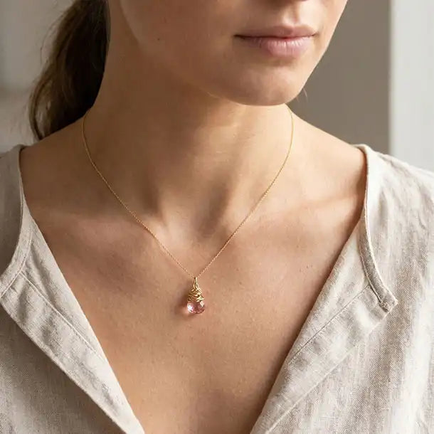 Handmade Pink Topaz Necklace shown on model. variant--Gold-fill, variant--Rose-gold-fill, variant--Sterling-silver, variant--Oxidized-sterling-silver variant--Pink-topaz
