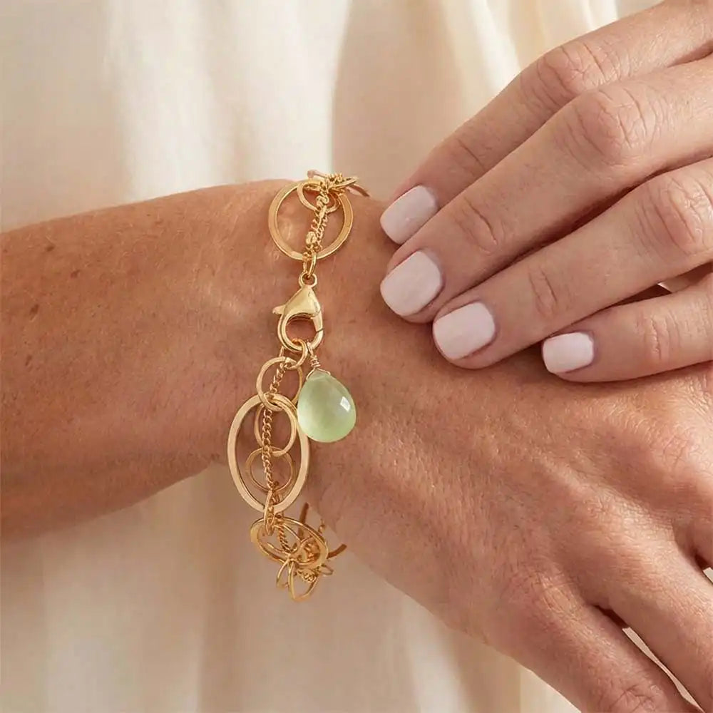 Natural prehnite woven chain bracelet in sterling silver, close-up of setting in gold-fill