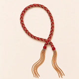 Red braided chain and silk tassel bracelet in 14K gold-fill, flat lay