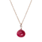 Rose Gold-fill Ruby necklace on a cable chain.