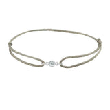 Silk knot adjustable bracelet with center round diamond in white gold