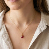 Handmade designer ruby pendant necklace shown on model variant--Gold-fill, variant--Rose-gold-fill, variant--Sterling-silver, variant--Oxidized-sterling-silver variant--Ruby