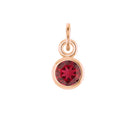 Ruby birthstone charm bezel-set in 14k rose gold — rich, romantic red gemstone for necklaces.