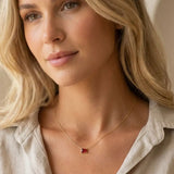 Minimalist birthstone necklace featuring a 5x3mm emerald shown on model variant-14K-yellow-gold variant-14K-white-gold variant-14K-rose-gold variant-Sterling-silver