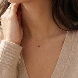 14K gold ruby necklace shown on model variant--14K-rose-gold,  variant--14K-yellow-gold,  variant--14K-white-gold, variant--Sterling-silver, variant--Ruby