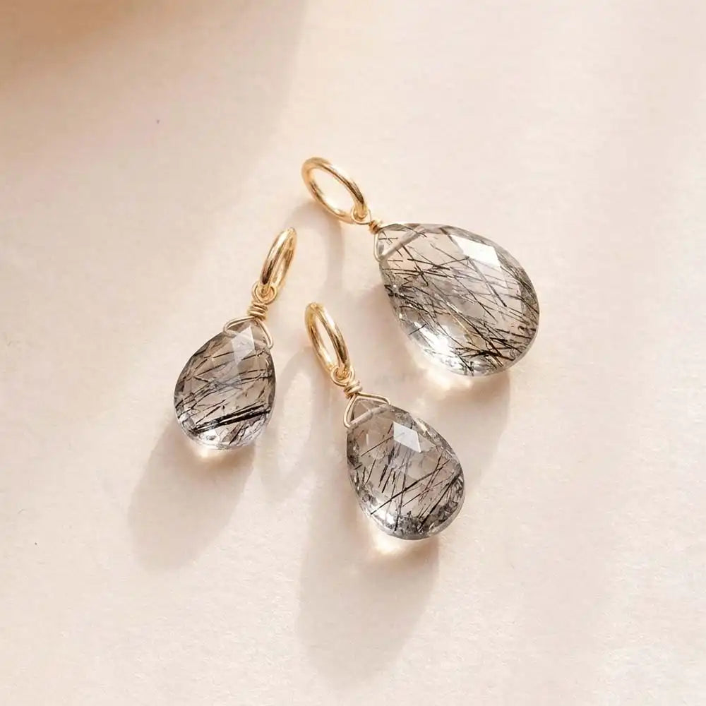 6mm faceted rutilated quartz briolette charm wrapped in gold-fill for delicate charm necklaces.
