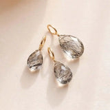 6mm faceted rutilated quartz briolette charm wrapped in gold-fill for delicate charm necklaces.