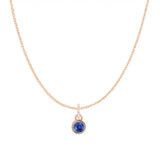 Natural sapphire birthstone charm necklace in 14K white gold, bezel-set pendant on cable chain, product shot variant--14K-white-gold variant--Sapphire