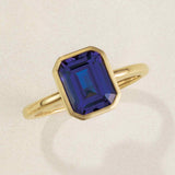 Sapphire bezel-set statement ring close-up
