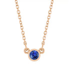 Bezel-set sapphire birthstone necklace in 14K rose gold, product view