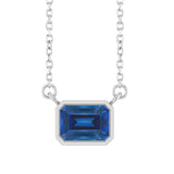 Close-up of white gold sapphire necklace with horizontal emerald cut stone variant--14K-white-gold variant--Sapphire