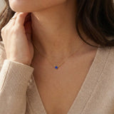14K gold sapphire necklace shown on model variant--14K-rose-gold,  variant--14K-yellow-gold,  variant--14K-white-gold, variant--Sterling-silver, variant--Sapphire