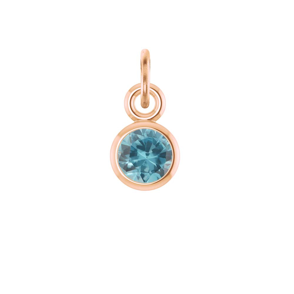 Swiss Blue Topaz birthstone charm in 14k rose gold — radiant blue December birthstone jewelry.