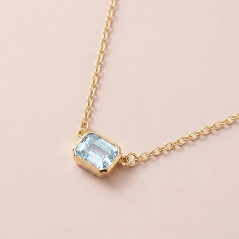 East West Swiss Topaz necklace in 14K yellow gold variant--14K-yellow-gold variant--14K-white-gold variant--14K-rose-gold variant--Sterling-silver variant--Swiss-topaz