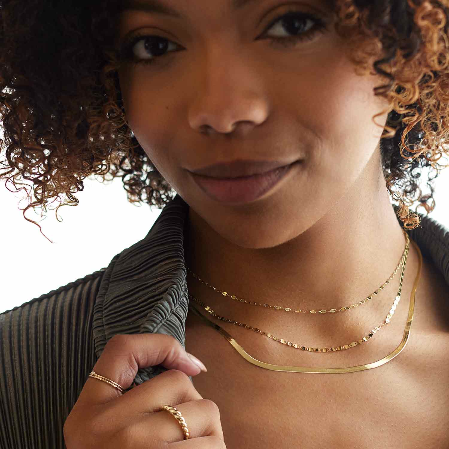 Tiny diamond stackable ring in 14K gold, side profile