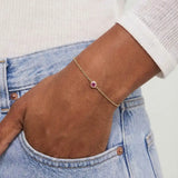 Model wearing bezel-set tourmaline bracelet variant--14K-yellow-gold variant--Tourmaline